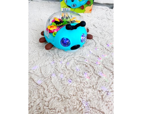 Игрушка Жук прозрачный музыкальный с вращающимися шестеренками внутри, арт. YJ-3039