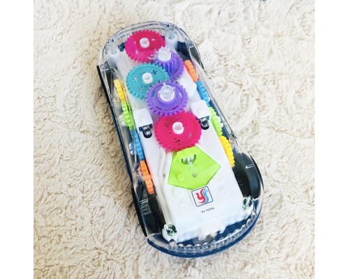 Игрушка Машинка прозрачная музыкальная с вращающимися шестеренками внутри, арт. YJ388-65