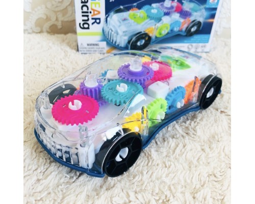 Игрушка Машинка прозрачная музыкальная с вращающимися шестеренками внутри, арт. YJ388-65