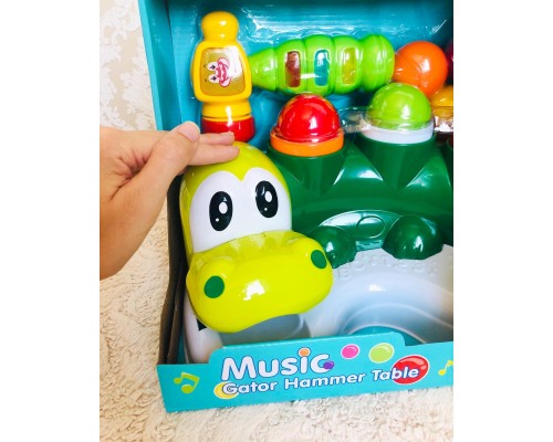 Игрушка стучалка с музыкальным молоточком, 326